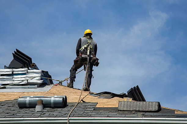 Professional Roofing technician working in Kew Gardens, NY